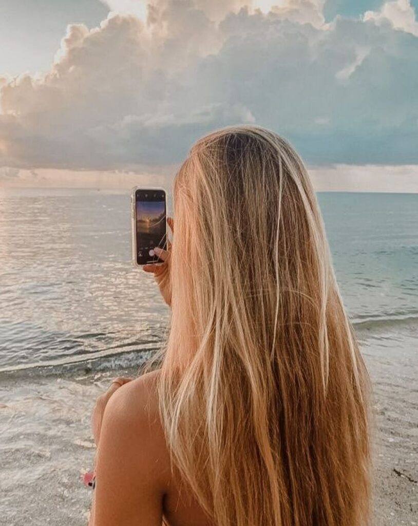 Ukrainian cam babe taking selfie by the sea