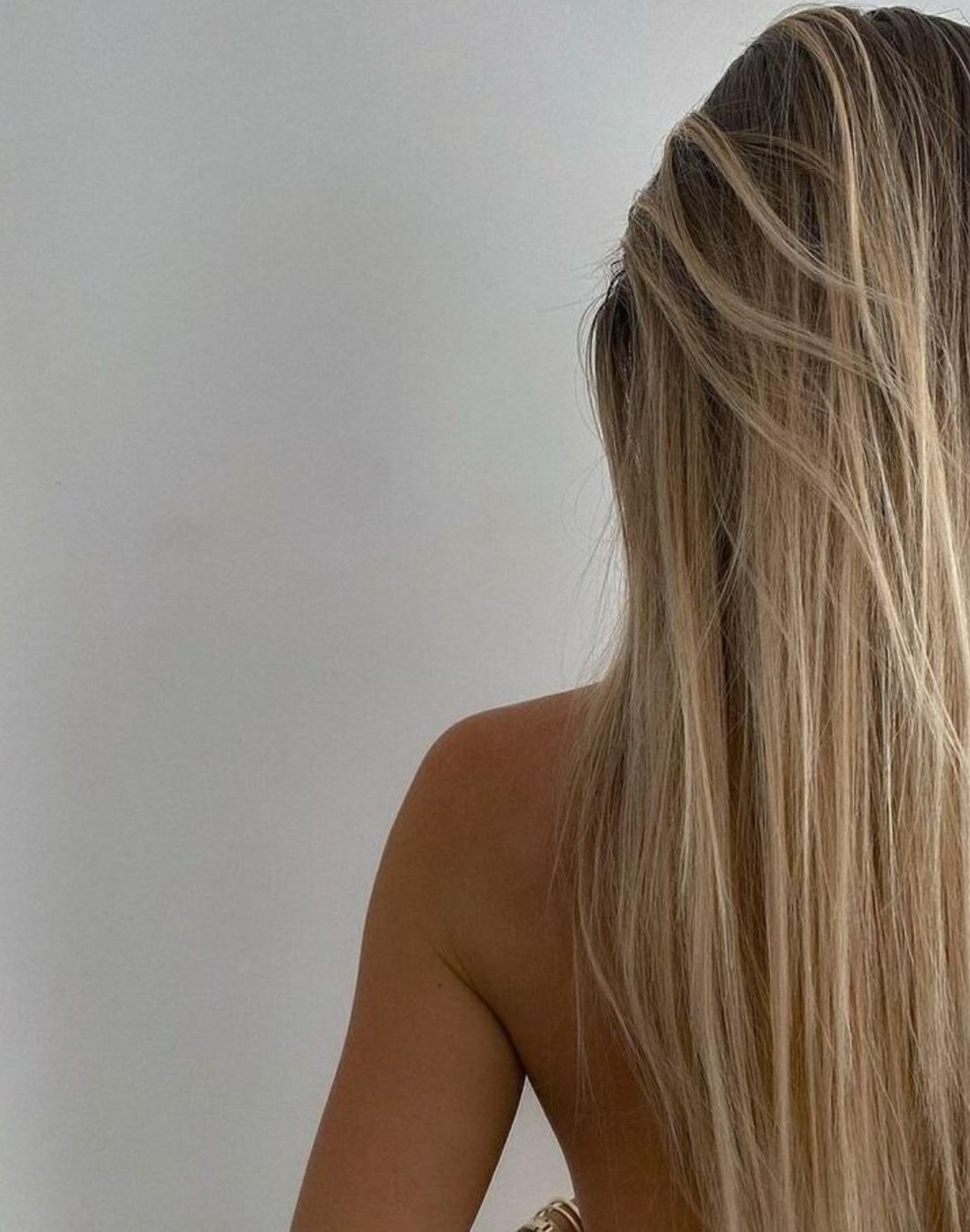 naked shoulder of Ukrainian blonde girl viewed from the back
